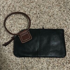 Nino Bossi genuine leather wristlet. Black with brown.